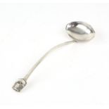 Scottish silver ladle surmounted with a model of a Celtic ship by Mary Johnston Graham,