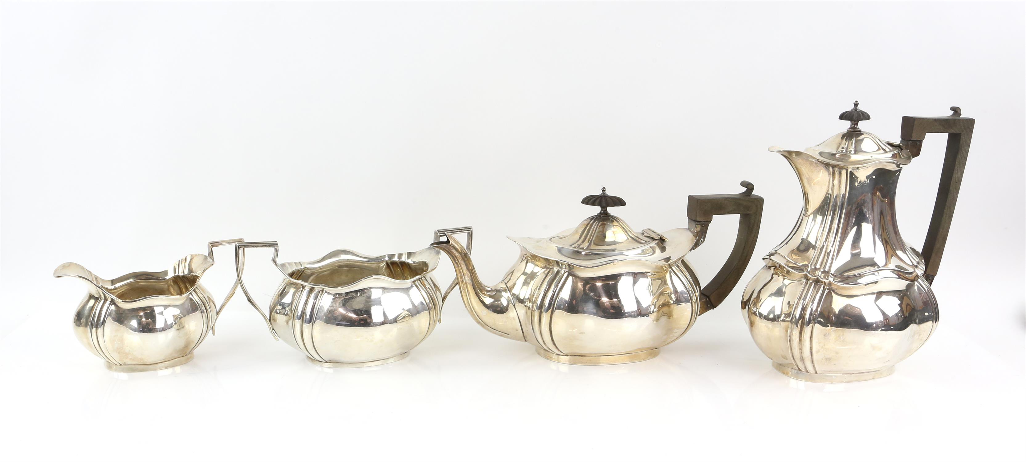 Edward VII silver four piece tea service, comprising teapot, hot water jug, cream jug and sugar