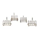 Four very similar miniature toast racks, approx 7 cms wide, 132 grms