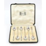 Liberty and Co cased set of six silver spoons with late art deco design, Birmingham 1935