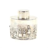 George V oval silver tea caddy and cover, with embossed figures in country life, byGeorge Nathan &