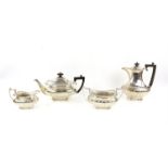 Edward VII silver four piece tea service comprising teapot, hot water jug, cream jug and sugar bowl,