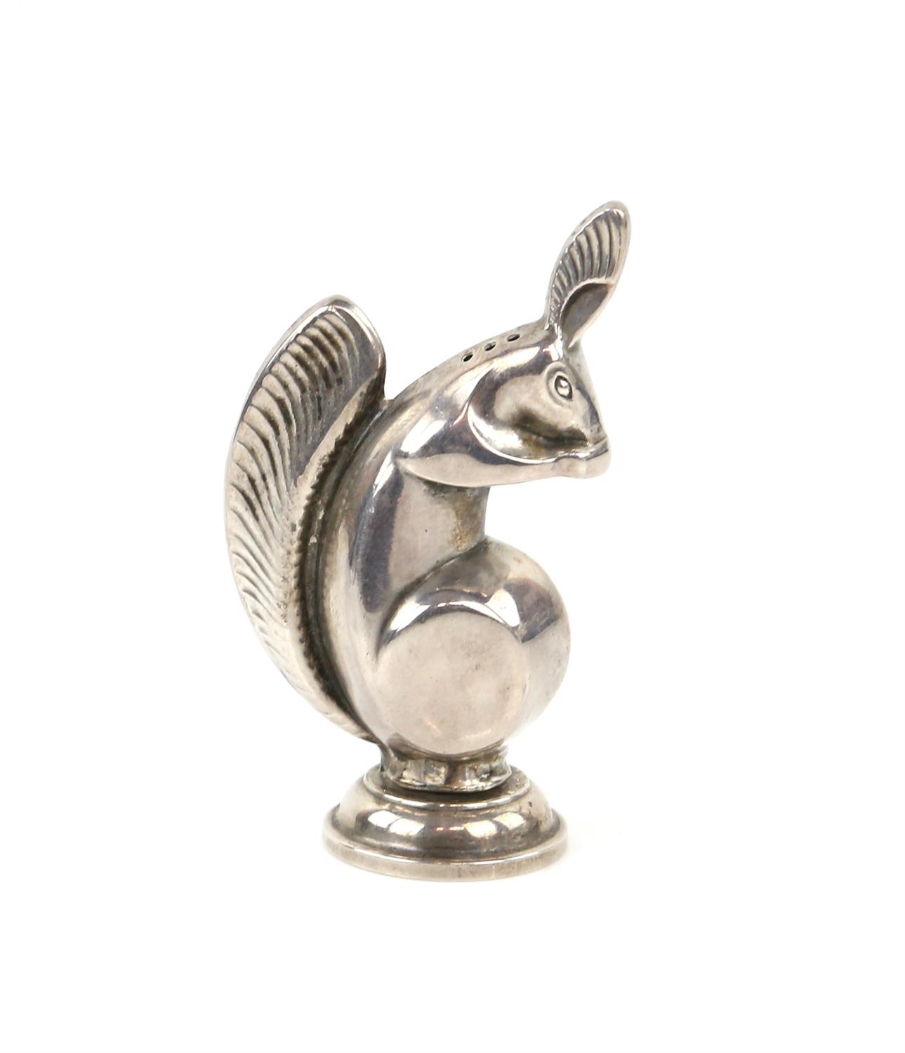 Novelty silver pepper pot cruet in the form of a squirrel eating a nut