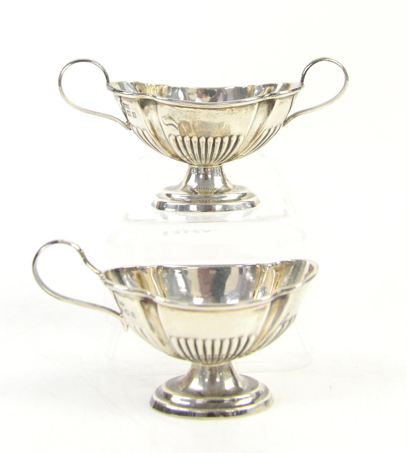 Novelty silver salts in the form of a sugar bowl and creamer, by Skinner and Co, London 1922