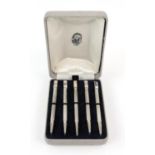 Unusual cased set of five silver bridge pencils, four with an individual suit marker and a larger