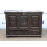 18th/19th century oak Mule Chest the front with three panels, carved with mask and scrolling floral