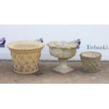 Reconstituted stone planter with basket weave design, having makers mark to interior,