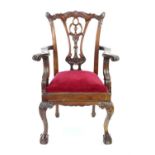 Early 20th century mahogany Chippendale style miniature arm chair with pierced scrolling floral