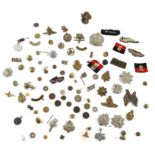 Assortment of Regimental cap badges, buttons and associated items
