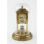 Gustav Becker brass torsion clock, the dial with Arabic numerals, having disc pendulum,