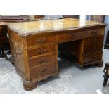 20th century partners desk, serpentine top with leather writing surface and floral carved edge,