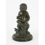 Victorian bronze sculpture of a child reading, on marble base. Height 31cm.