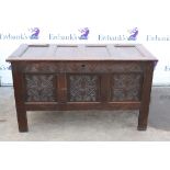 19th century oak coffer, with three panel front with floral carved frieze, H69cm W122cm and D54cm