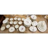 Extensive Royal Copenhagen dinner service with blind lattice border and floral decoration,