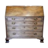 19th century mahogany bureau with fall flap enclosing drawers and pigeon holes, over four long