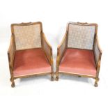 Early 20th century Bergere suite single cane back and sides stuff over seats claw and ball feet