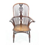 19th century yew wood and elm Windsor high hoop back chair on turned legs joined by crinoline