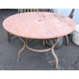 Terracotta coloured marble top garden table, on metal base, h75cm diameter 115cm