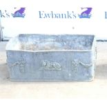 20th century rectangular lead planter with moulded swag and lion decoration, H25.5 x W64 x D33cm