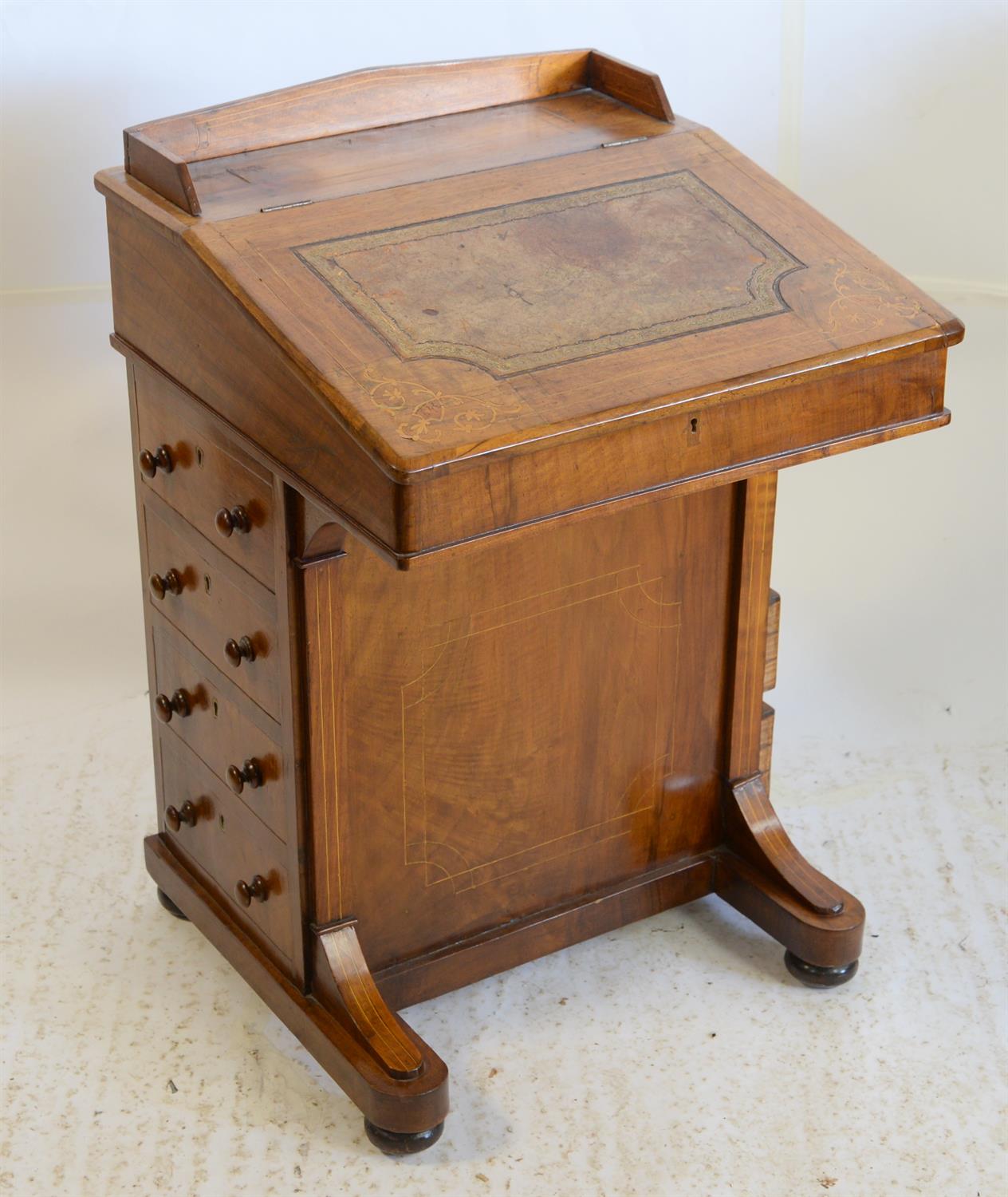 Victorian inlaid walnut davenport, the slope top with leather writing surface revealing fitted
