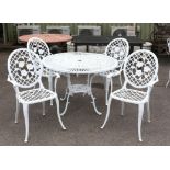 White painted cast metal garden table, with pierced circular top with scrolling floral decoration,