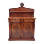 Victorian mahogany chiffonier with raised and single shelf over drawer and cupboards on plinth base,