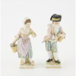 Pair of 19th century Berlin porcelain figures of a young man and woman with a basket of flowers,