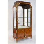 François Linke (French, 1855-1946), an early 20th century mahogany and inlaid vitrine,