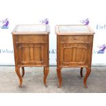 Pair of Austrian walnut bedside cupboards with faux marble tops, each with a single drawer and