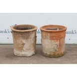 Set of four terracotta planters of circular form, decorated with bands of flowers and figures in