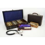 Optician`s early 20th Century portable eye test set with fitted tray of lenses, and a 1950s doctors