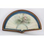 H Bach, Madrid, a 19th century fan with carved ivory guard stick, the chicken skin leaf hand