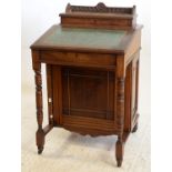 Late 19th century mahogany Davenport the gallery top with hinged lid revealing ink wells and letter
