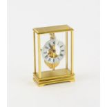 Jaeger Le Coultre desk timepiece, with Roman numeral chapter ring and gilt brass case, No 533, 10cm