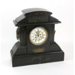 Victorian black slate presentation mantle clock with bronze mounts, classical freeze and masks,