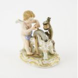 19th century Meissen figure of Eros sharpening an arrow head, on naturalistic gilt highlighted base,