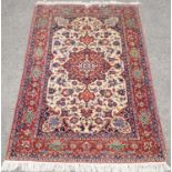 Persian Bakhtiar rug, central floral medallion and scrolling floral design, within floral