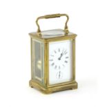 Early 20th century brass carriage clock in obis case, with alarm movement, key present,