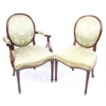 Set of eight early 20th century mahogany oval back dining chairs, with light green upholstery with
