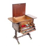 Regency mahogany and rosewood cross-banded drop-flap work table with dummy drawers and drawers on
