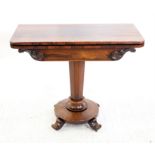 19th century rosewood fold over card table on octagonal column support and four scroll feet and
