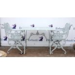 Grey painted cast metal table and two matching chairs,