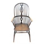 19th century ash and elm high hoop back Windsor chair, on turned legs joined by a stretcher, h112.
