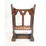 Late 19th century oak Church Pew, open double arch back, the seat with quatrefoil cut outs,