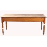 19th century Breton fruitwood farmhouse table with bread drawer and slide, on turned legs,