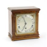 Elliott walnut cased 8-day Westminster / Westminster-Whittington chime clock, with square silvered