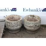 Pair of circular composite stone planters, 31.5cm diameter,