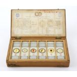 Cased set of Arthur C Cole microscope slides, Series No. 3-24 Educational Physiological