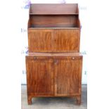19th century mahogany waterfall bookcase cabinet with open shelves over cupboard enclosing shelf