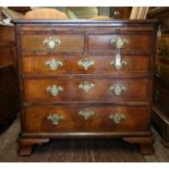 AMENDED DESCRIPTION 19th century bachelor's walnut chest, with brushing slide over two short and